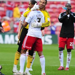 Bristol city Goalkeeper David James celebrates with match winner Marvin Elliott on the final whistle