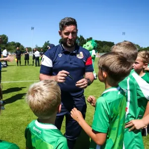 Bristol City Head Coach Lee Johnson Meets Young Mascots Before Guernsey Friendly Bristol City Head Coach Lee Johnson Meets Young Mascots Before Guernsey Friendly