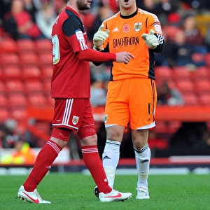 Bristol City: Heaton and Bates in Deep Conversation during Blackpool Match