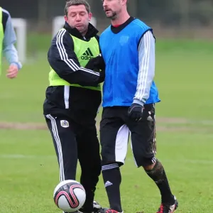 Bristol City: Intense Training Clash between Captain Carey and Assistant Manager Docherty