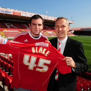 Bristol City Manager Keith Milken Presents NPower Super Fan Dan Blake with a Team Shirt (Bristol City v Burnley) Bristol City Manager Keith Milken Presents NPower Super Fan Dan Blake with a Team Shirt (Bristol City v Burnley)
