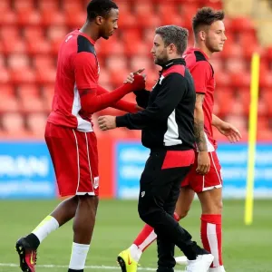 Bristol City Manager Lee Johnson Shakes Hands with Jonathan Kodjia after Preseason Friendly vs Cheltenham Town (25.07.2016)