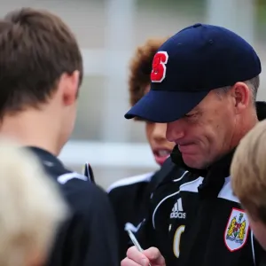 Bristol City Manager, Steve Coppell signs autographs for the academy players Bristol City Manager, Steve Coppell signs autographs for the academy players