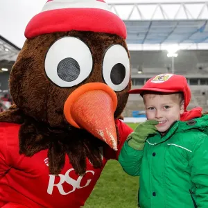 Bristol City Mascot Scrumpy Delights Young Fan with Cap Presentation at Ashton Gate Stadium Bristol City Mascot Scrumpy Delights Young Fan with Cap Presentation at Ashton Gate Stadium
