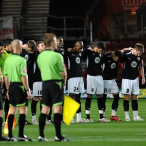 Bristol City Players line up for a minutes