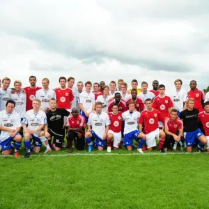 Bristol City Players and Vallens Players have a team photo together Bristol City Players and Vallens Players have a team photo together