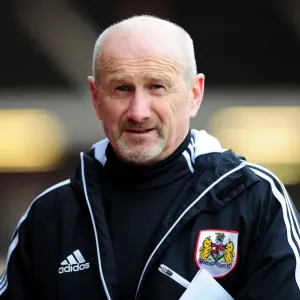 Bristol City: Richard Kelly, Assistant Manager Focused During Barnsley Match at Ashton Gate, 2013