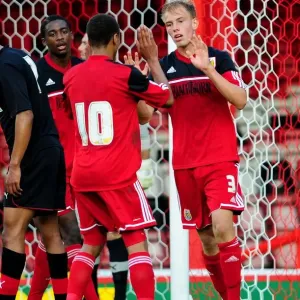 Bristol City U21s Celebrate Win: Bobby Reid Congratulates Tom King Bristol City U21s Celebrate Win: Bobby Reid Congratulates Tom King