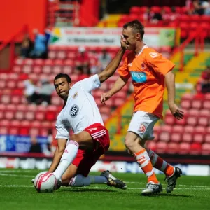 Bristol City vs Blackpool: Liam Fontaine's Battle for the Ball - Championship Football Match, July 2010