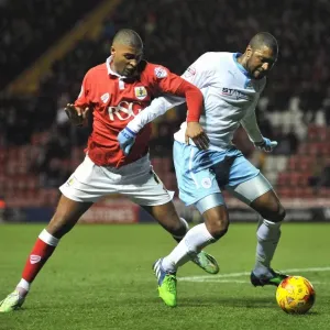 Bristol City vs Coventry City: Mark Little vs Reda Johnson - Intense Battle for the Ball