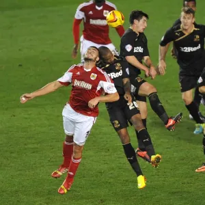 Bristol City vs Crawley Town: Intense Aerial Battle Between Derrick Williams and Emile Sinclair Bristol City vs Crawley Town: Intense Aerial Battle Between Derrick Williams and Emile Sinclair