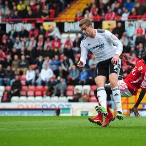 Bristol City vs Derby County: Albert Adomah Tackles Steve Davies on the Field