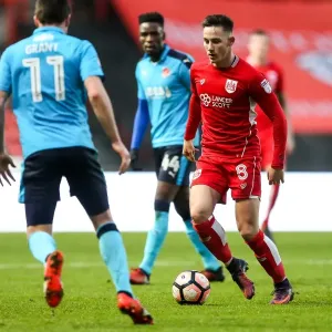 Bristol City vs Fleetwood Town: Intense Clash between Josh Brownhill and Bobby Grant at Ashton Gate Stadium, FA Cup Third Round Bristol City vs Fleetwood Town: Intense Clash between Josh Brownhill and Bobby Grant at Ashton Gate Stadium, FA Cup Third Round