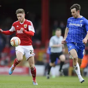 Bristol City vs Gillingham: Wes Burns vs Steven Gregory - Intense Football Clash at Ashton Gate