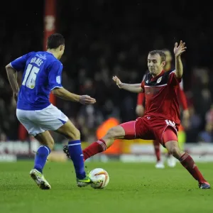 Bristol City vs Leicester City: Intense Battle for the Ball between Liam Kelly and Matthew James
