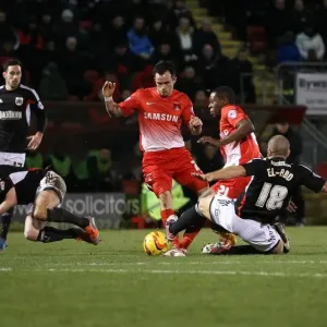 Bristol City vs Leyton Orient: Intense Battle for Possession between Adam El-Abd and Marvin Bartley Bristol City vs Leyton Orient: Intense Battle for Possession between Adam El-Abd and Marvin Bartley