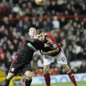 Bristol City vs. Middlesbrough: Aerial Clash Between James Wilson and Scott McDonald Bristol City vs. Middlesbrough: Aerial Clash Between James Wilson and Scott McDonald