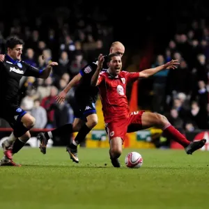 Bristol City vs Portsmouth: Lewin Nyatanga Fouled by David Cotterill - Championship Clash at Ashton Gate Stadium (08/03/2011)