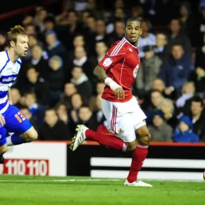 Bristol City vs QPR: Intense Moment Between Marvin Elliott and Kasper Gorkss during the Npower Championship Clash at Ashton Gate (October 22, 2010)