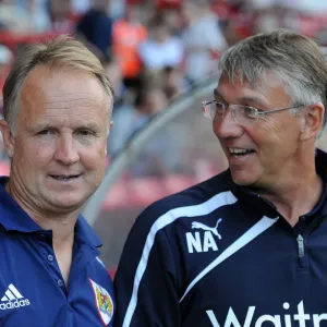 Bristol City vs. Reading: Nigel Adkins and Sean O'Driscoll Share a Light-Hearted Moment on the Touchline