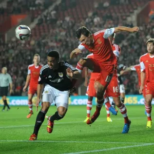 Bristol City vs Southampton: Intense Header Battle Between Derrick Williams and Jack Cork