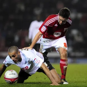 Bristol City vs Swansea City: Lee Johnson vs Darren Pratley Battle for Ball in Championship Match, 01/02/2011