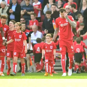Bristol City vs. Wolverhampton Wanderers: Kick-Off at Ashton Gate - Mascots and Players in Action