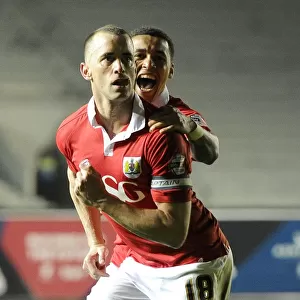 Bristol City: Wilbraham and Tavernier Celebrate Goal Against Swindon Town in Sky Bet League One, 2015