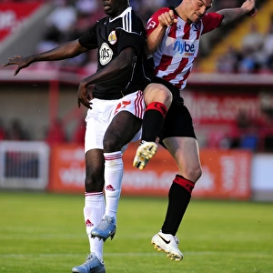 Bristol Citys Albert Adomah battles for the ball