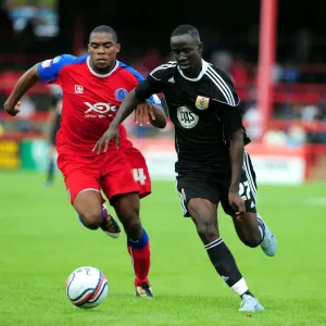 Bristol Citys Albert Adomah battles for the ball with Aldershots Manny Panther Bristol Citys Albert Adomah battles for the ball with Aldershots Manny Panther