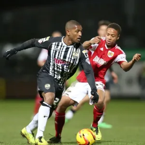 Bristol City's Bobby Reid vs. Notts County's Andre Boucaud: A Football Showdown at Meadow Lane (December 2013) Bristol City's Bobby Reid vs. Notts County's Andre Boucaud: A Football Showdown at Meadow Lane (December 2013)