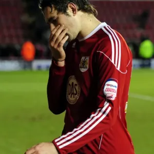 Bristol City's Brett Pitman Departure: A Dejected Moment at Ashton Gate in FA Cup Match against Sheffield Wednesday (08/01/2011)