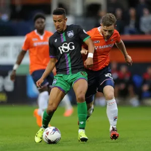 Bristol City's Callum Robinson Battles for the Ball against Luton Town's Mark O'Brien - Capital One Cup First Round, 2015 Bristol City's Callum Robinson Battles for the Ball against Luton Town's Mark O'Brien - Capital One Cup First Round, 2015
