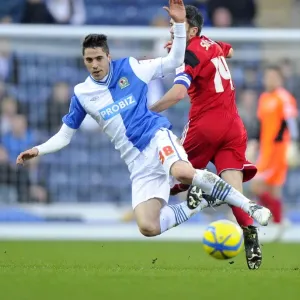 Bristol City's Cole Skuse Tackles Diogo Rosado in FA Cup Clash at Ewood Park