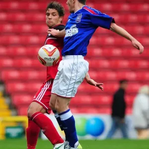 Bristol City's Curtis Jones Tackles Ipswich Town's Bryan Lawrence in Intense U21s Clash Bristol City's Curtis Jones Tackles Ipswich Town's Bryan Lawrence in Intense U21s Clash