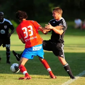 Bristol Citys Danny Ball battles for the ball