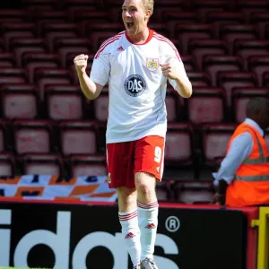 Bristol City's David Clarkson Celebrates Championship Goal Against Blackpool (2010)