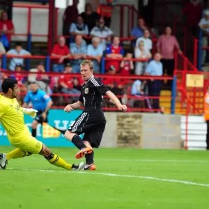 Bristol Citys David Clarkson sees his shot saved by Aldershots Jamie Young Bristol Citys David Clarkson sees his shot saved by Aldershots Jamie Young