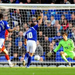 Bristol City's David James Denies Ipswich Town's Michael Chopra: A Football Rivalry Moment at Portman Road (03/03/2012)