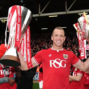Bristol City's Glory: Aaron Wilbraham Lifts Sky Bet League One and JPT Trophies