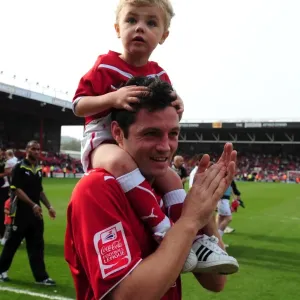 Bristol City's Ivan Sproule and Son: A Heartwarming Moment at Ashton Gate Stadium (Bristol City v Derby County, Championship, 2010) Bristol City's Ivan Sproule and Son: A Heartwarming Moment at Ashton Gate Stadium (Bristol City v Derby County, Championship, 2010)