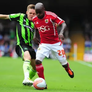 Bristol City's Jamal Campbell-Ryce Fights for Ball in Intense Championship Match against Brighton - September 10, 2011