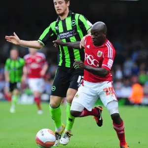 Bristol City's Jamal Campbell-Ryce vs. Brighton's Inigo Calderon: Battle for the Ball in Championship Match, September 10, 2011