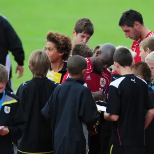 Bristol Citys Jamal Camplbell-Ryce and Bristol Citys Bradley Orr sign autographs for the academy Bristol Citys Jamal Camplbell-Ryce and Bristol Citys Bradley Orr sign autographs for the academy