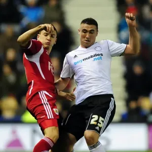Bristol City's James Wilson vs Callum Ball in Championship Clash at Derby County, 10/12/2011