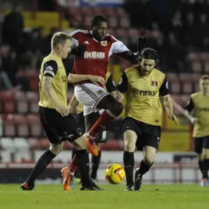 Bristol City's Jay Emmanuel-Thomas Tries to Break Through Two Defenders during Bristol City v Leyton Orient, Sky Bet League One Match at Ashton Gate