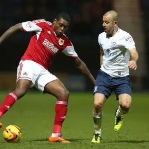 Bristol City's Jay Emmanuel-Thomas vs. Preston North End's Keith Keane - Intense Battle on the Field Bristol City's Jay Emmanuel-Thomas vs. Preston North End's Keith Keane - Intense Battle on the Field