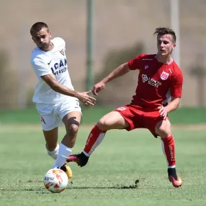 Bristol City's Joe Bryan in Action: Tussling for the Ball during Pre-season Friendly at La Manga Bristol City's Joe Bryan in Action: Tussling for the Ball during Pre-season Friendly at La Manga