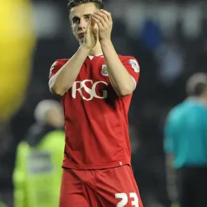 Bristol City's Joe Bryan Applauding Fans Amidst the Derby County Rivalry Bristol City's Joe Bryan Applauding Fans Amidst the Derby County Rivalry