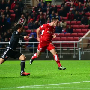 Bristol City's Joe Bryan Charges Towards Goal vs. Brentford